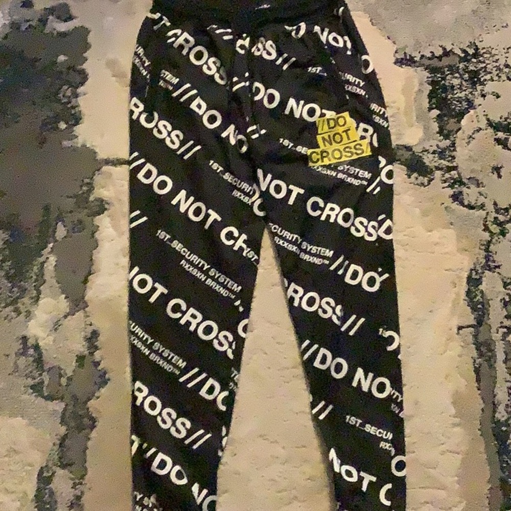 DO NOT CROSS patterned joggers